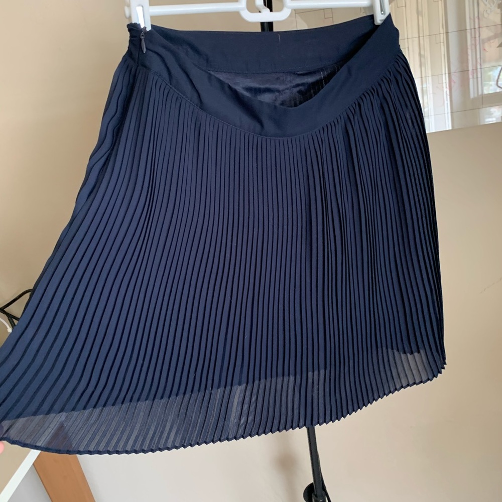 Blue pleated mini-skirt
